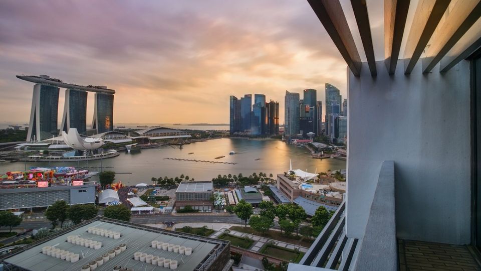 Catch some of the circuit's fastest spots from Parkroyal Marina Bay