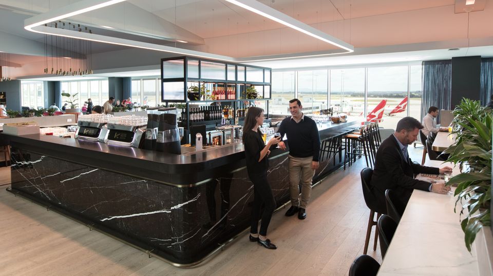 Relax before you fly with 2 complimentary Qantas Club airport lounge passes each year.