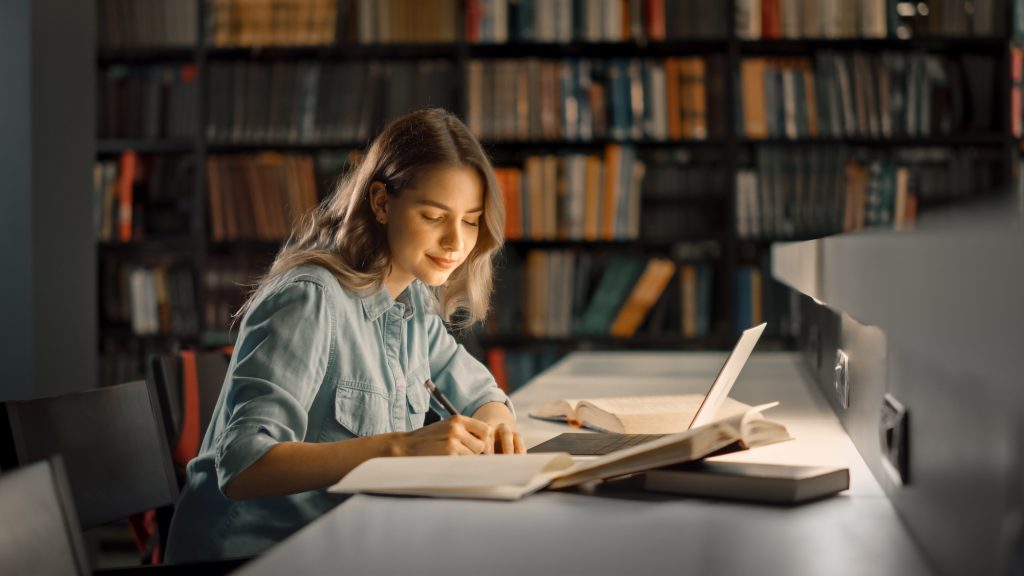 college student studying in the library